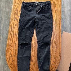 Size 7 Garage Black jeans with slits in the knees
